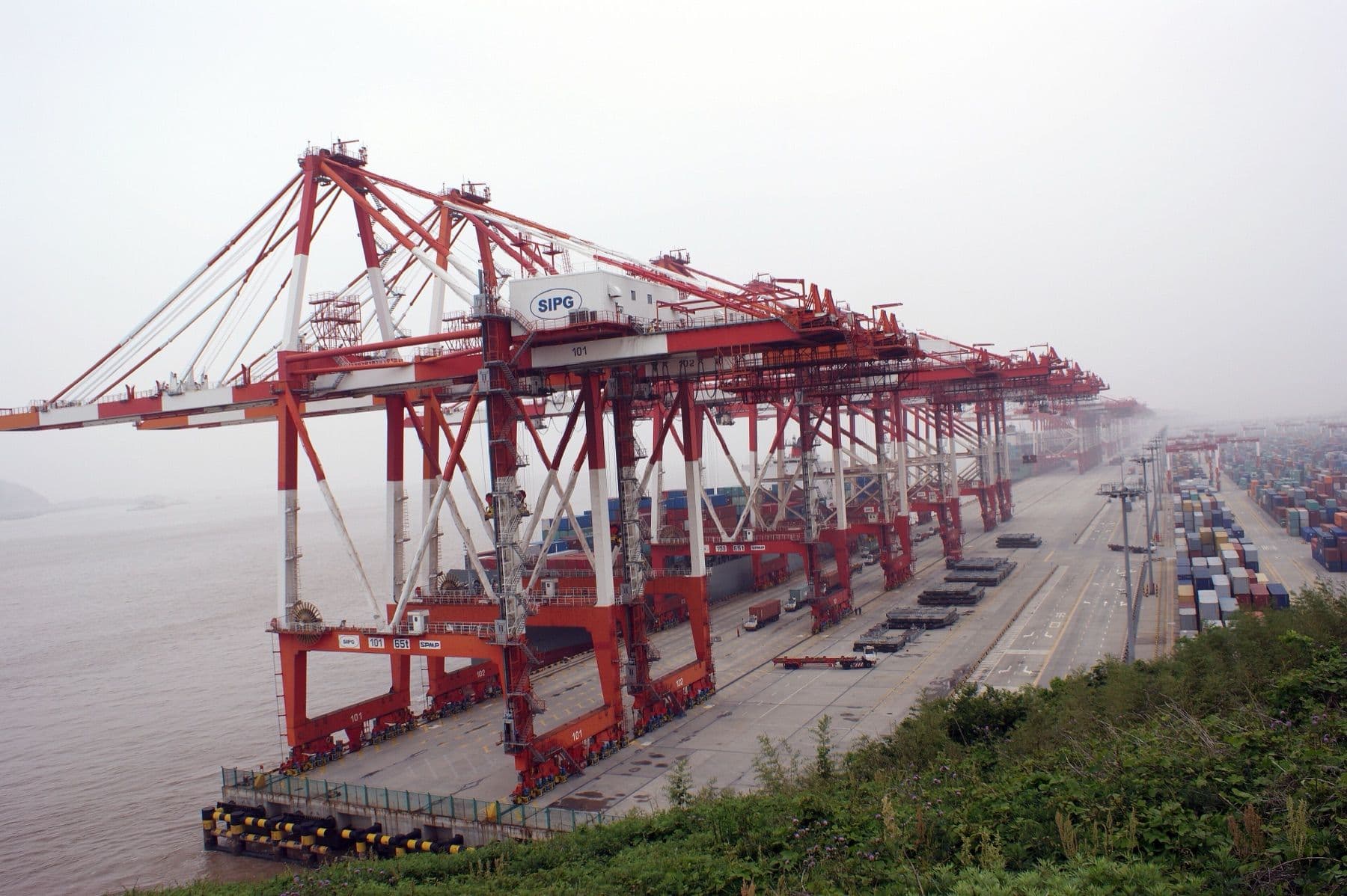 Ship-to-shore container cranes along the quay at Shanghai's Yangshan Deep-Water Port