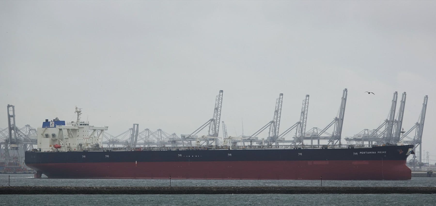 A very large crude carrier (VLCC) in port
